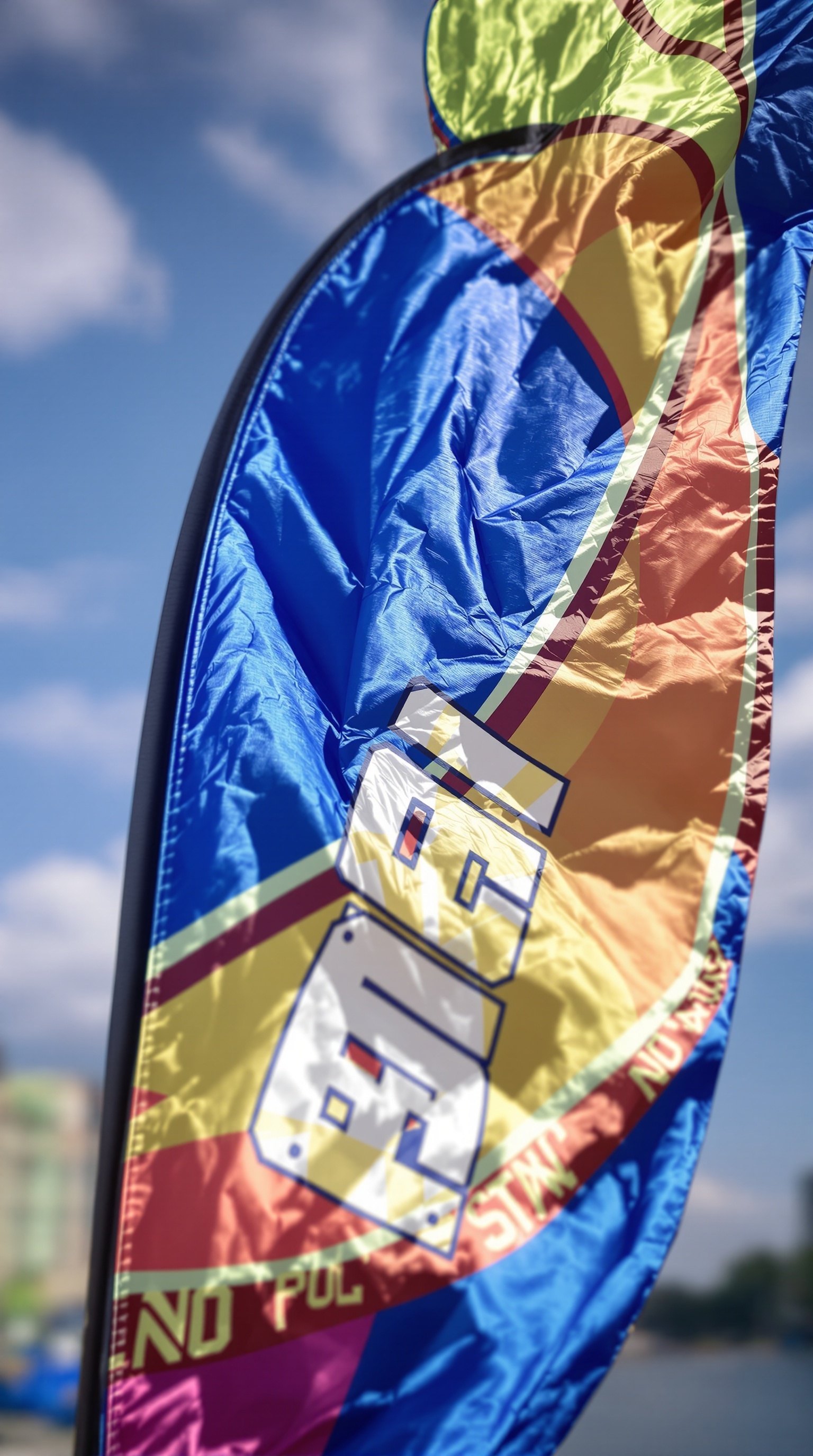 Dynamic feather flag in motion showing superior visibility