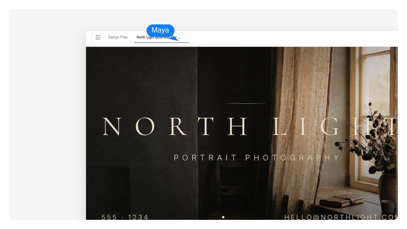 Front of a photography studio business card shown at actual print size