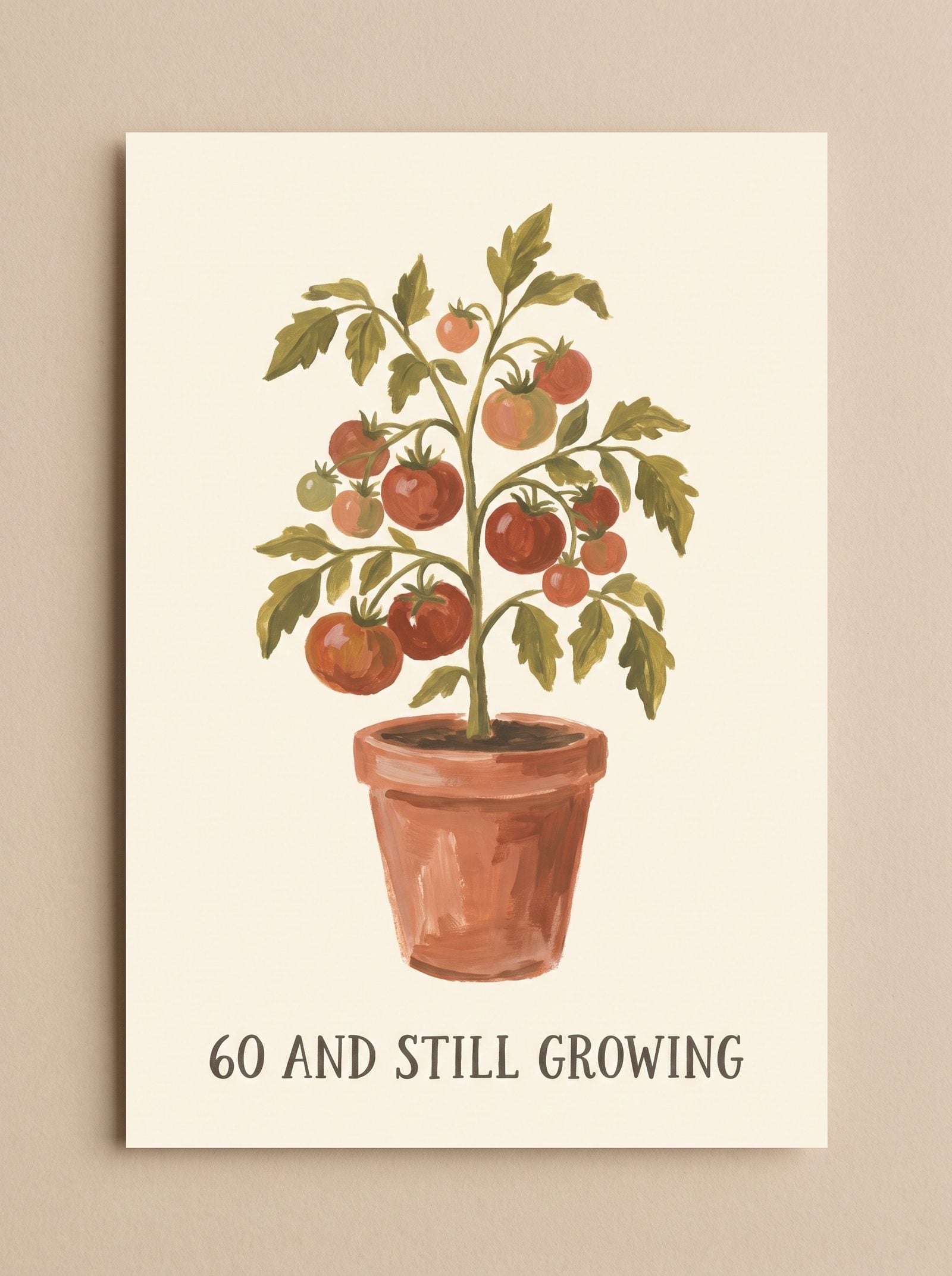 Birthday card front — hand-painted tomato plant with the headline '60 and still growing'