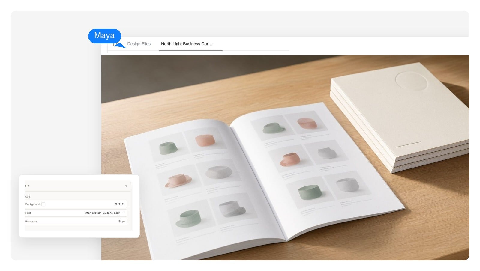 Printed furniture catalog open on a desk beside a stack of copies