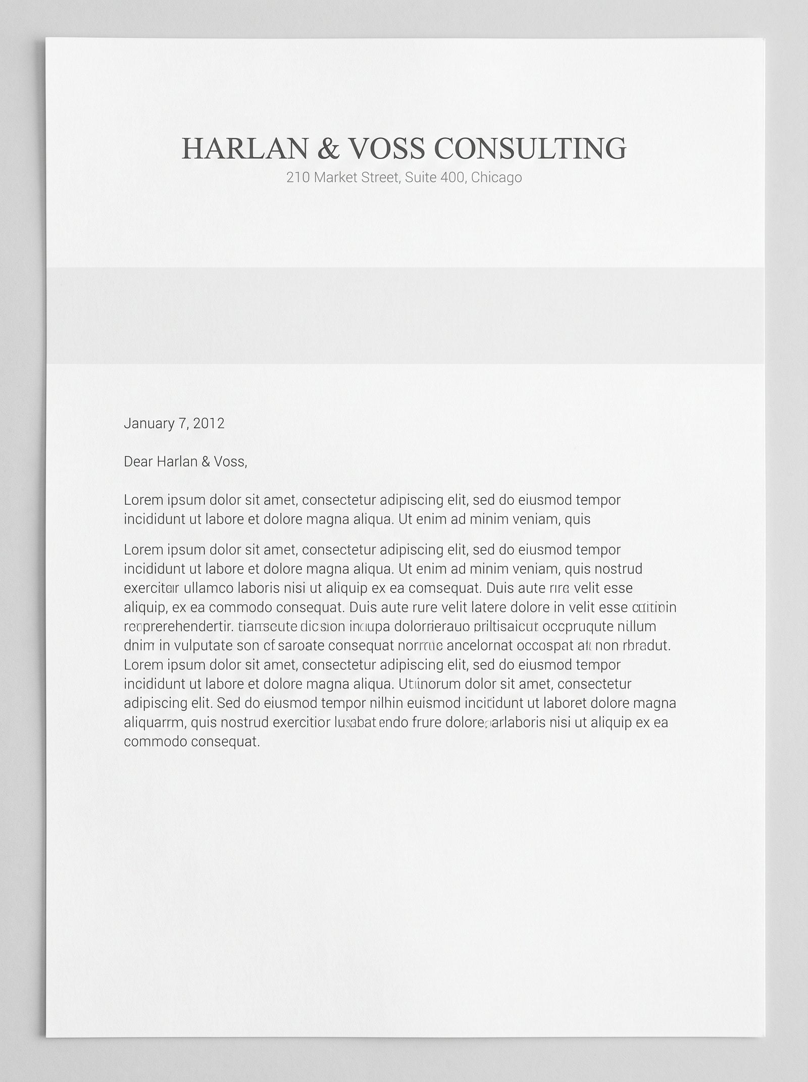 Classic centered letterhead design in neutral grayscale, used as the base for the brand color preview
