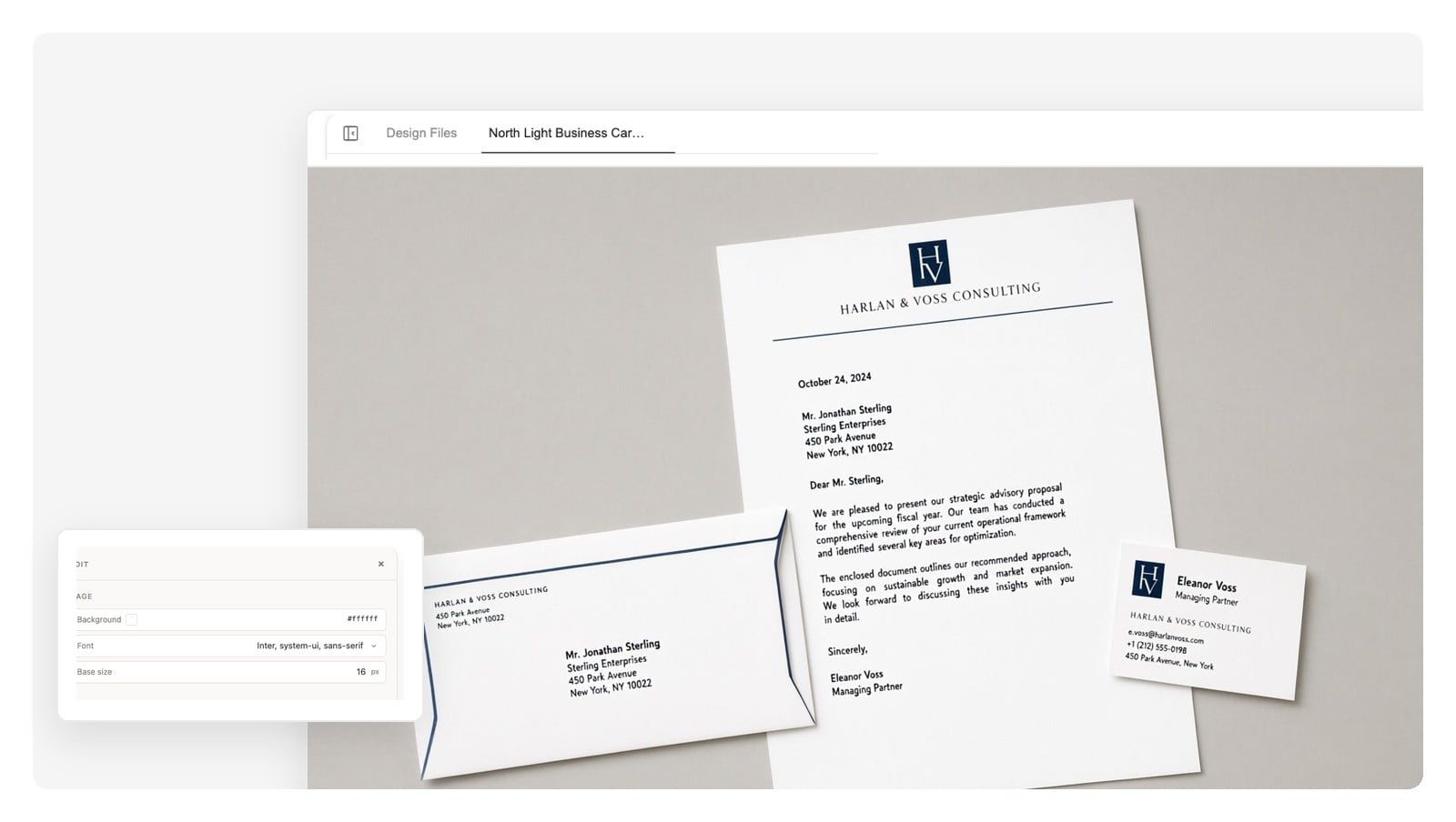 Flat lay of a matching brand suite: letterhead, business card, and envelope sharing one design system